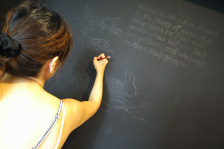Using a Pencil To Outline The Wall Graphic
